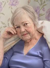 Can someone edit this photo of my mom to remove the hospital setting and  nasal canula?