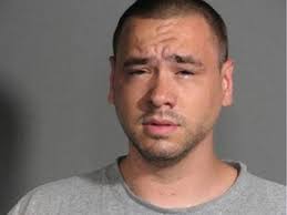 Man arrested in recent firearms roundup allegedly tried to bribe cops