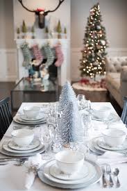 Ramping up the energy with plenty of red and green can get everyone feeling warm. Setting Up The Christmas Table Decorations Kelsey Bang