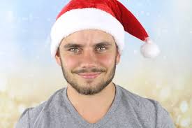 Noel Baba şapkası ile genç iş adamı — Stok Foto © rdrgraphe #59295755