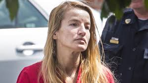 Police: Woman laughed after killing social worker