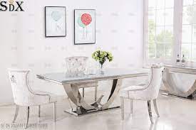 Throw a party for every birthday and holiday with one of our 7 piece dining room sets. China New Arrival Dining Room Furniture Stainless Steel Glass Top Dining Table China Dining Table Table