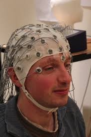 EEG cap with gel-based electrodes inserted. Photo by Chris Hope, made...