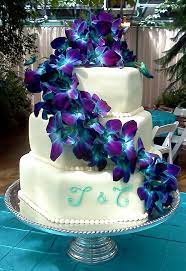 Pin By Field And Floral On Cake Flower Ideas Orchid Wedding Cake Blue Orchid Wedding Tiered Wedding Cake