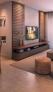 Das aufhängen des fernsehers hilft platz sparen starr oder schwenkbar. Die Perfekte Fernsehwand Uberrascht Die Gaste Fernsehfonds Tv Wand Tv Hintergrund Fernsehfon Living Room Tv Wall Living Room Design Modern Living Room Tv Unit