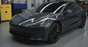 Midnight Silver Metallic Tesla Model 3 Shows Its Darker Side With Chrome Delete Carscoops