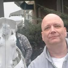 George being modest about his guitar playing skills