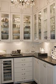 The kitchen island serves as centerpiece with its beige granite countertop and dark warm wood paneled plinth and base. Butler S Pantry Easy Kitchen Updates Kitchen Design Kitchen Remodel