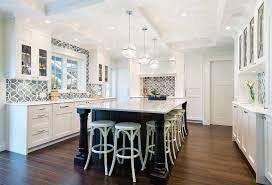 Any color can shine given the right complements, especially blue and white. White Kitchen With Blue Gray Backsplash Tile Home Bunch Interior Design Ideas