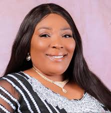 Son sells newspapers with elderly mother in George Town intersection