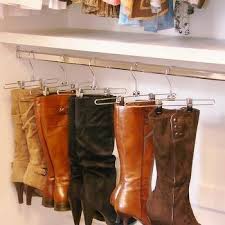 The shoes tend to be too tall for regular containers. Closet Boot Storage Design Ideas