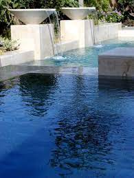 A full infinity edge pool, this pool breaks up the space of the deck very nicely. Pin On Pool Lanai