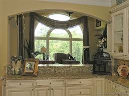 Off white kitchen cabinets with dark granite countertops. Pin By Kim Turner Nagy On Passthrough Ideas Antique White Kitchen Antique White Kitchen Cabinets Kitchen Pictures