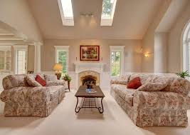 Standard white ceiling paint will brighten a room, but a colored ceiling may make the room seem bigger. Vaulted Ceiling Living Room Design Ideas