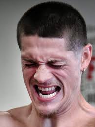 Trainer Anthony Comer helps stabbing survivor Corey Andrade recover