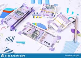 Indian 10 Rupee Notes And Pen On The Chart Paper Stock Photo