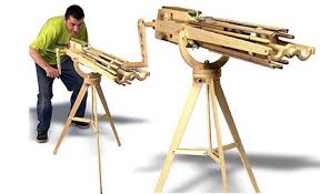 12 shot rubber band gun. Feature Gatling Rubber Band Guns Made From Wood Techeblog