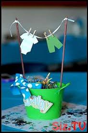 Simple paper strips glued or taped. 865 Baby Shower Centerpieces Ideas Baby Shower Centerpieces Baby Shower Shower Centerpieces