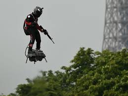 bastille day hoverboard carries gun toting flying soldier during military parade in paris the independent the independent bastille day hoverboard carries gun
