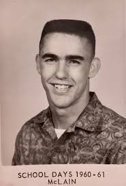 Found a photo of guys from McCurtain. Not sure what building is in the  background. Left to right: Jimmy Anderson, Raymond Lane, Albert Davis.  Probably taken in the early 1960's.