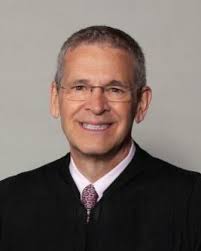 Yes, that is alumni parent and United States District Court Chief Judge  Jack McConnell in the headlines for his decisions unfreezing federal grant  programs, a leading case in the judicial response to