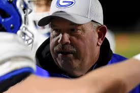 Garmon retires; Glasgow seeks football coach
