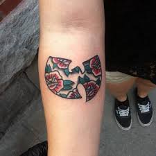Justin dion at sovereign tattoo in portland oregon. Traditional Style Floral Wu Tang Clan Tattoo On The