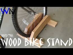 The materials that went into the construction of this bike repair stand were purchased from my local big box store as off the shelf items including the 3/4″ black steel pipe and the black malleable iron fittings. How To Build A Wood Bike Stand Youtube Wood Bike Diy Bike Rack Bike Stand