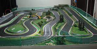 Check out our slot car race track selection for the very best in unique or custom, handmade pieces from our toys shops. This Slot Car Track Is A Beautiful Homage To Motorsport In 2021 Slot Cars Carrera Slot Cars Slot Car Race Track