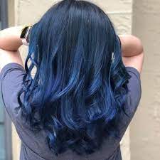 Perfect woman portrait on black background. 19 Most Amazing Blue Black Hair Color Looks Of 2021