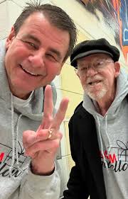 A community stalwart. A man of few words and many actions. Holding his  family in love and compassion.