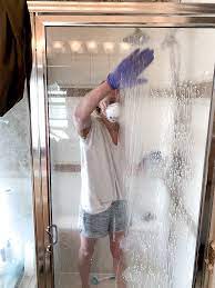 Be sure to thoroughly saturate the areas with the lemon: How To Remove Hard Water Stains From Glass Shower Doors The Forked Spoon