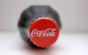 Although the coke label is internationally. The Real Reason The Coca Cola Logo Is Red Reader S Digest