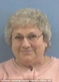 Woman gunned down in a triple murder last year had accused her killer just  minutes earlier of shooting her sister to death decades ago