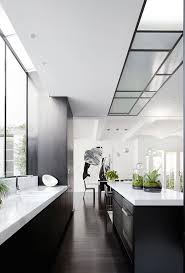 Black And White House Interior Kitchen Sophisticated Monochromatic Home In Melbourne S Toorak White Interior Design Neutral Kitchen Designs Modern Kitchen Interiors