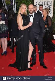 Schauspieler jason statham war schon als kind überaus aktiv und hüpfte aus seinem diese physische dna ist also schon immer ein teil unserer familie gewesen, erklärte er. Rosie Huntington Whiteley Jason Statham An Der 70th Golden Globes Awards 2013 Im Hilton Hotel In