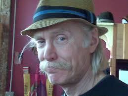 At the moment, I sing and play with a steel-string acoustic and pick. As I  am building up my finger-style accompaniments, should I now be looking at  buying a nylon-string guitar for