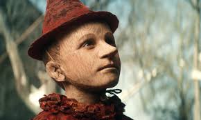 Geppetto's puppet creation, pinocchio, magically comes to life with dreams of becoming a real boy. Pinocchio Review A Mesmerisingly Creepy Live Action Retelling Family Films The Guardian