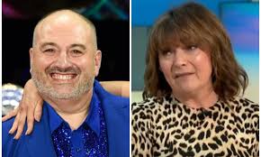 Wynne Evans called a 'nutter' by Lorraine Kelly as she weighs-in