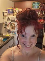 Criticism of a man's hairstyle, specifically a curl