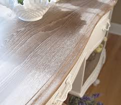 Sometimes the only thing an old piece of wood furniture needs is a new finish. Annie Sloan White Wax Desk Restyle Salvaged Inspirations