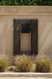 The overall thickness of plaster walls changes from the original wall thickness. Tariq Fahmi Villa Exterior Walls In Plastering Finish Decorated With Traditional Crafts Like Metal Screens Inviting Local Culture In This Contemporary Building Archnet