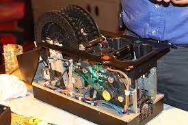 The larger build of the shuffler is enhanced, with small gears that help ensure cards are always shuffled, smoothly. A Rare Look Inside A Casino Automatic Card Shuffler Vital Vegas
