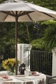 How To Make Tablecloths For Patio Tables With Umbrellas Hunker Diy Outdoor Table Patio Table Umbrella Diy Patio Table