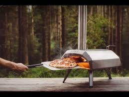 Ooni Karu Portable Pizza Oven Uses Wood Charcoal Or Both As Fuel It Is Also Compatible With Ooni Gas Burner In 2020 Pizza Oven Portable Pizza Oven Wood Fired Pizza