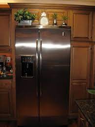 Might Was Well Decorate Top Of Fridge Who Can Reach Stuff In The Cabinet Above It Fridge Decor Farmhouse Kitchen Decor Kitchen Decor