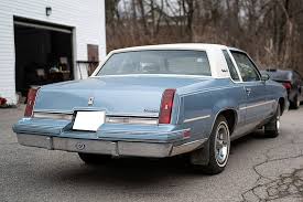 Image result for Light Driftwood 1987 Oldsmobile