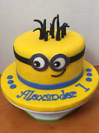 Then, roll yellow fondant over the majority of the cake and use blue fondant to. Minion Cake For A 1 Year Old Minion Cake Cupcake Cakes Cake