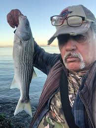 Fishing under Jekyll Causeway Bridge in East River