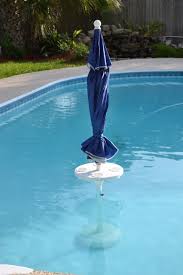 Relaxation Station Swimming Pool Table And Stools Aughog Products Beach Umbrella Sand Anchors Sandbar Anchors And More Pool Umbrellas Pool Shade Cool Swimming Pools
